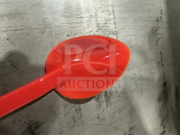 Brand new Cambro 13" red solid serving spoon, model SPO13CW404, for deli or salad bar use.