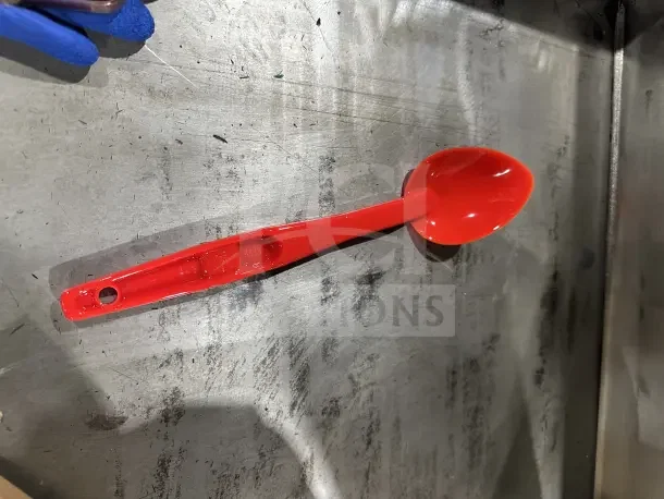 Brand new Cambro 13" red solid deli/salad bar serving spoon, model SPO13CW404, in pristine condition.
