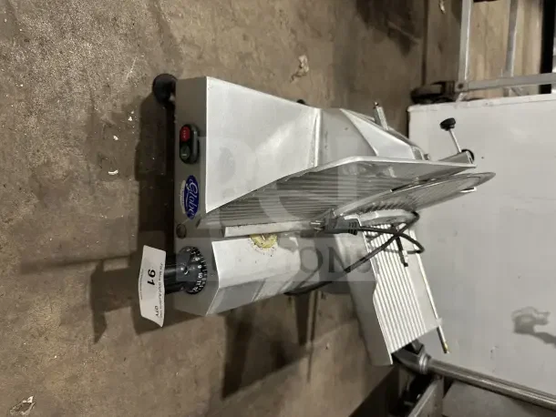Chefmate GC12 commercial deli meat slicer, stainless steel, electric, gravity feed, Globe Series, manual controls, SN: 302283.