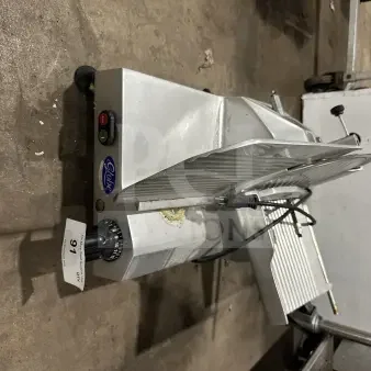Chefmate GC12 commercial deli meat slicer, stainless steel, electric, gravity feed, Globe Series, manual controls, SN: 302283.