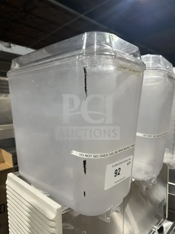 Crathco D35-4 beverage machine, 3 hoppers, 115V, on legs, visible markings and labels, good condition.