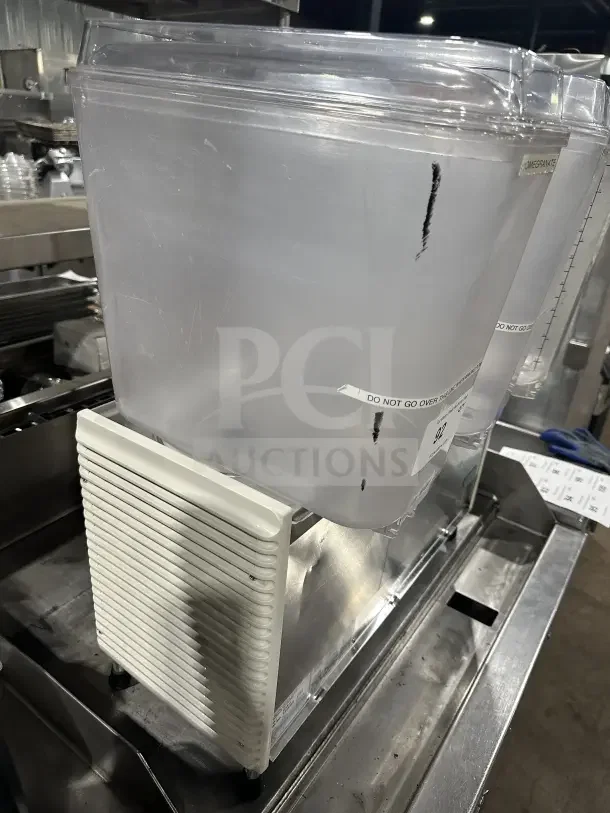Crathco Commercial Countertop 3 Hopper Beverage Machine, Model D35-4, Serial TT539395, 115V, on legs, in used condition.