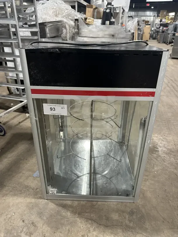 Commercial 4-tier electric heated pizza merchandiser, countertop design, glass sides, visible shelving, excellent condition.