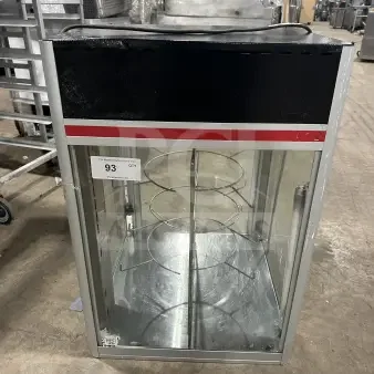 Commercial 4-tier electric heated pizza merchandiser, countertop design, glass sides, visible shelving, excellent condition.