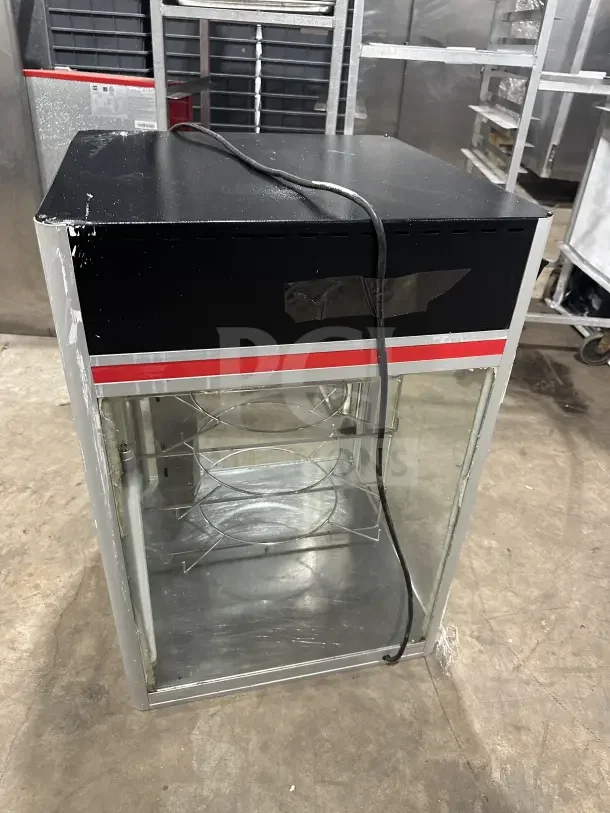 Commercial 4-tier electric heated pizza merchandiser with glass front, black top, and red accent. Used condition.