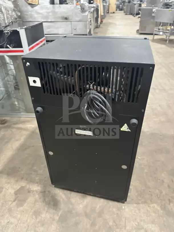 Turbo Air CTM32W commercial countertop cooler, single door, black finish, with poly coated rack, 110/120V, rear view.