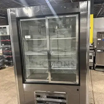 Leader LS54SC stainless steel reach-in refrigerator merchandiser with rear sliding glass doors and poly-coated rack.