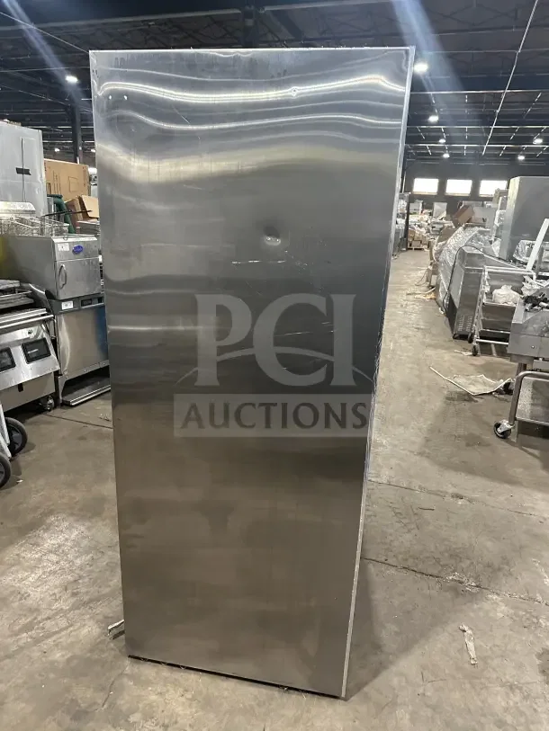 Leader LS54SC stainless steel reach-in refrigerator merchandiser with rear access sliding glass doors, poly-coated rack.