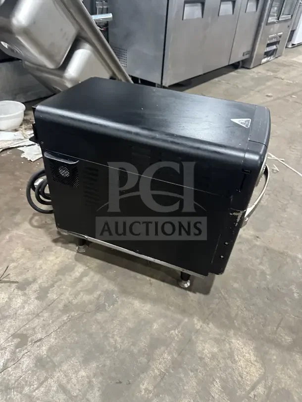 TurboChef NGO commercial electric countertop rapid cook oven in black, features digital push controls, good condition.