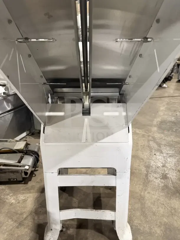 Oliver Model 79732NC electric bread slicer, commercial-grade, white, stainless steel worktop, on casters, 115V, used condition.