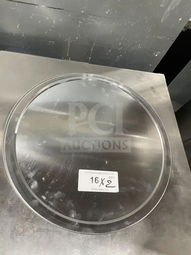 Thunder Group ALPTWR018 commercial stainless steel pizza tray, 16-inch diameter, durable design, new condition, label visible.
