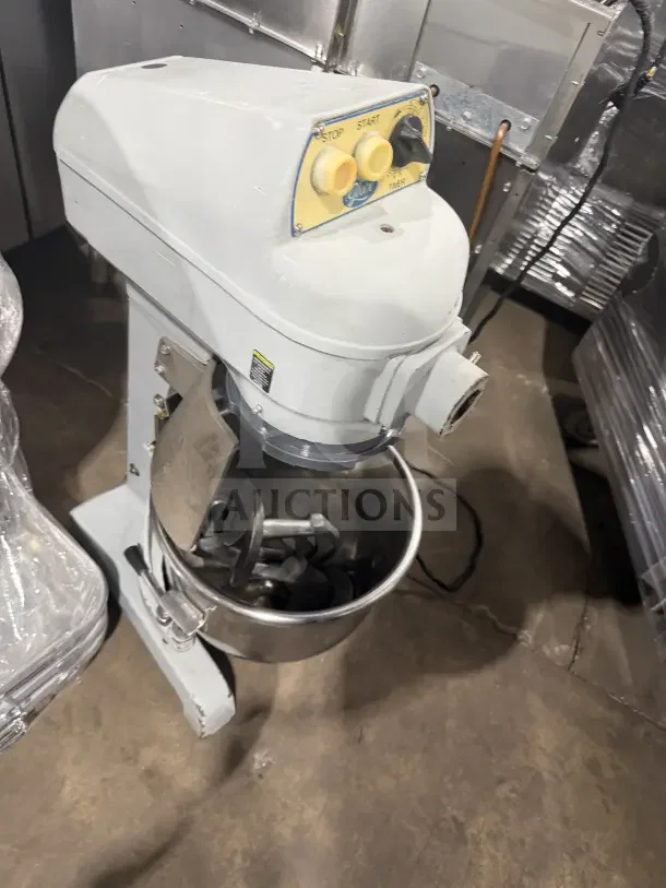 Globe 20 Qt. electric stand mixer with stainless steel bowl; features stop/start buttons, used condition.