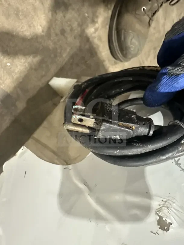 Clawson PC-2000 ice crusher power cord, black, standard US plug, stainless steel body corner visible, minor wear.