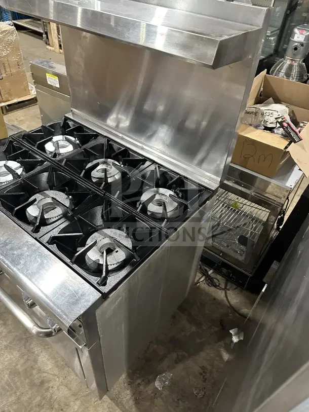 Pantin stainless steel natural gas 6-burner range and oven combo with wired rack and backsplash. Excellent condition.