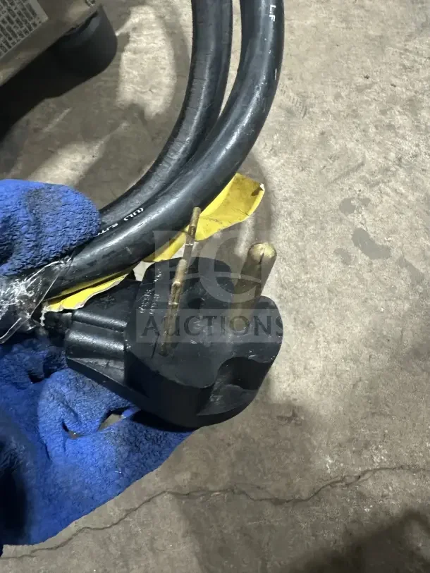 Close-up of a power plug for Electrolux HSPPA1 commercial sandwich press, showing a three-prong 208V plug and cables.