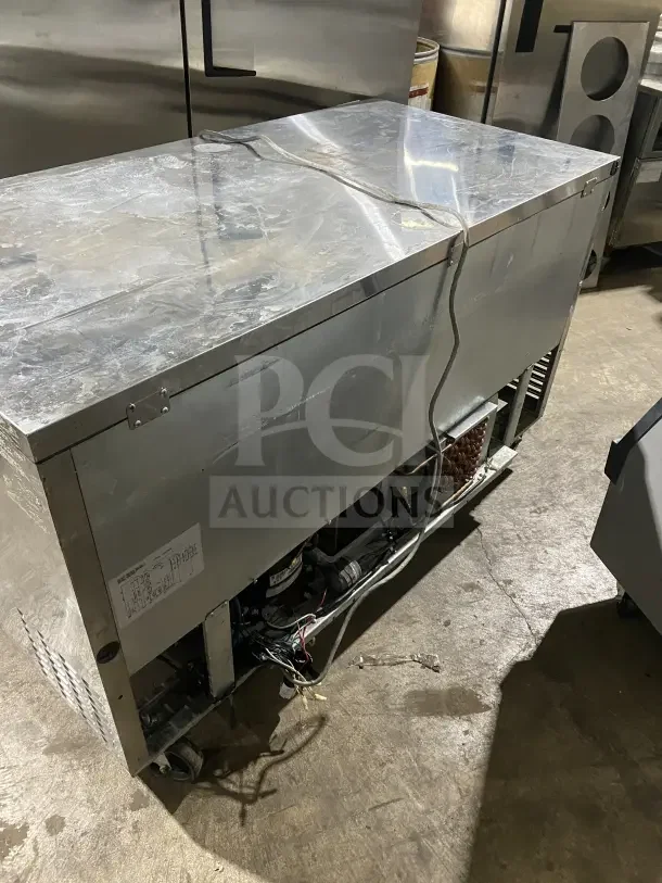 Turbo Air MUF60 stainless steel 60" 2-door undercounter freezer with poly coated wired rack, on casters, 115V.