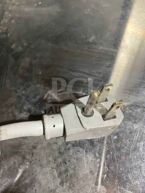 Turbo Air MUF-60 freezer power plug, showing standard 115V connector, hinting at commercial kitchen use.