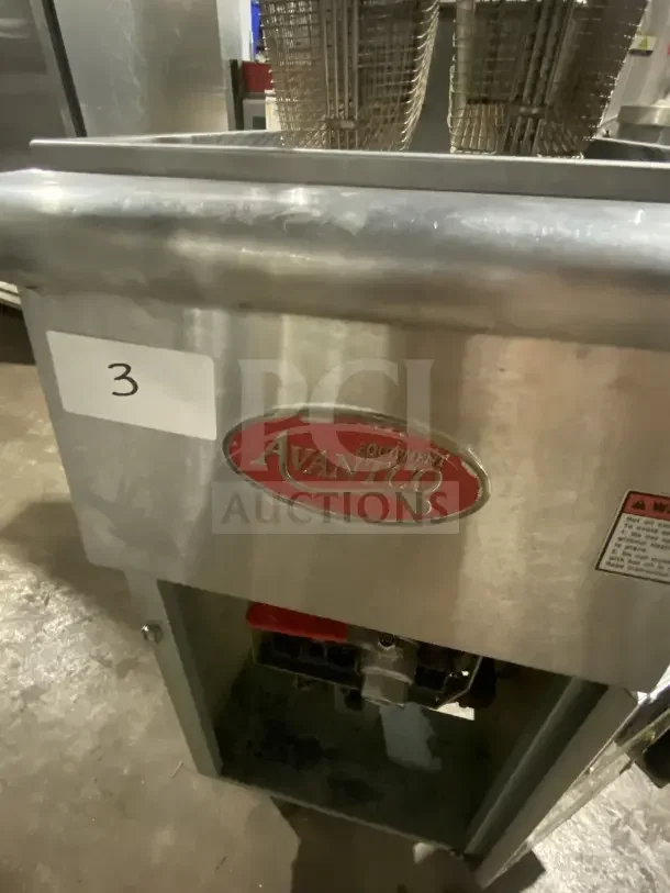 Avantco FF300N stainless steel natural gas fryer, 2016 model, with basket hanger, fry basket, and backsplash. Serial: 20020370VA.