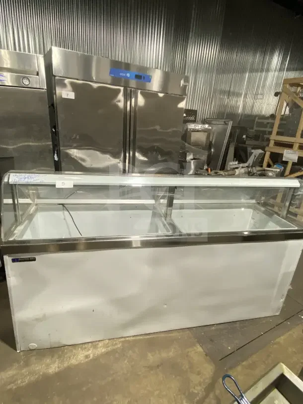Master-Bilt commercial ice cream dipping cabinet, model DD88CG, 69" wide, white with poly-coated wire rack, used condition.