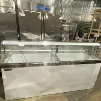 Master-Bilt commercial ice cream dipping cabinet, model DD88CG, 69" wide, white with poly-coated wire rack, used condition.