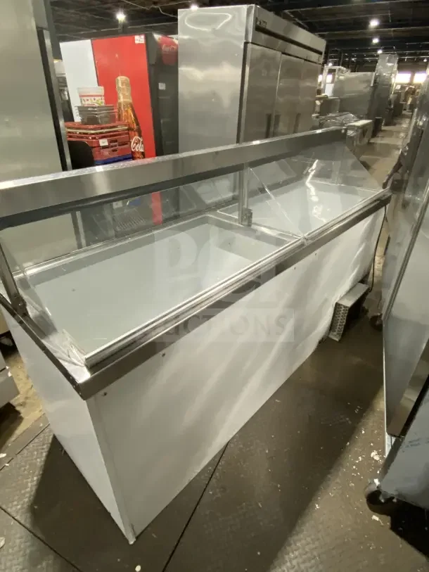 Master-Bilt DD88CG 69" ice cream dipping cabinet, low glass front, poly-coated wire rack, 115V, commercial use.
