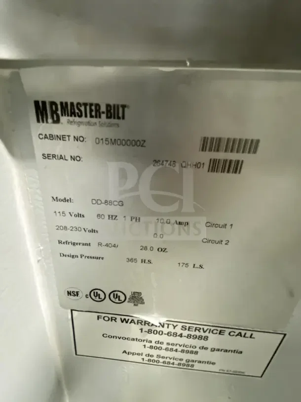 Alt Text: Master-Bilt ice cream dipping cabinet model DD88CG label showing 115V, 60Hz, and serial number 264748.
