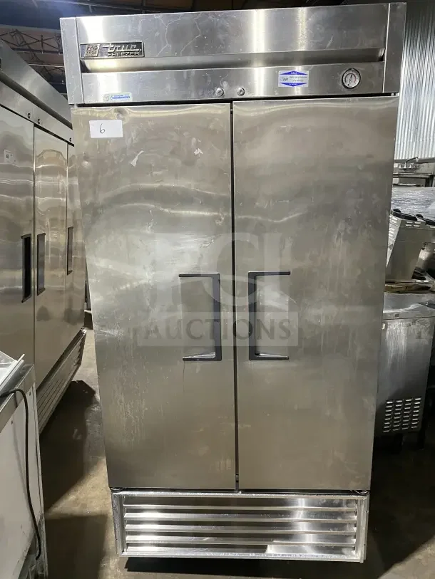 True T35F commercial stainless steel 2-door reach-in freezer, poly-coated racks, on casters, model 5205317, 115V, 1 phase.