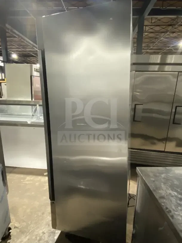 True T35F stainless steel 2-door reach-in freezer, commercial use, poly-coated wire rack, casters, 115V, 1 phase.
