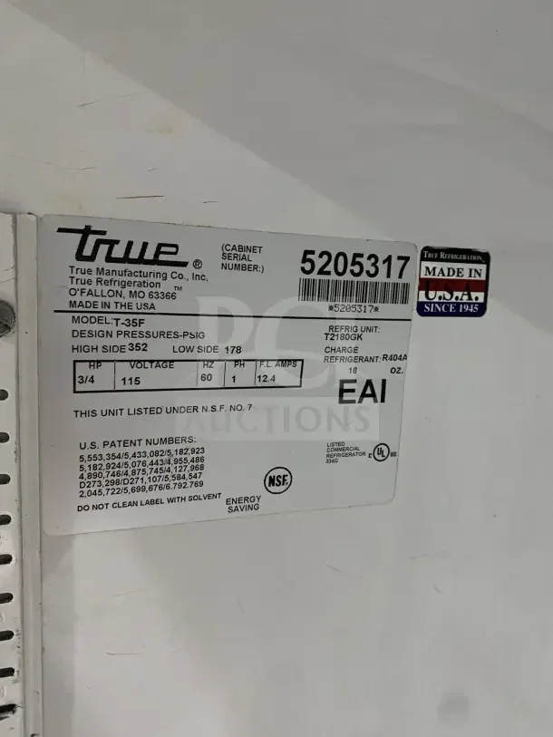True T35F stainless steel 2-door reach-in freezer, includes poly-coated wired rack, model T35F, 115V, on casters, SN: 5205317.