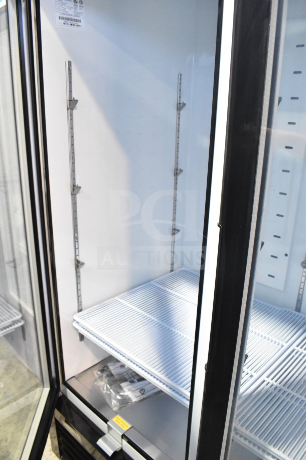 Brand new 2023 Migali C-72RM-HC 3-door reach-in cooler on casters. 115V, 1 phase, serial C-72RM-HC003220520092C0017.