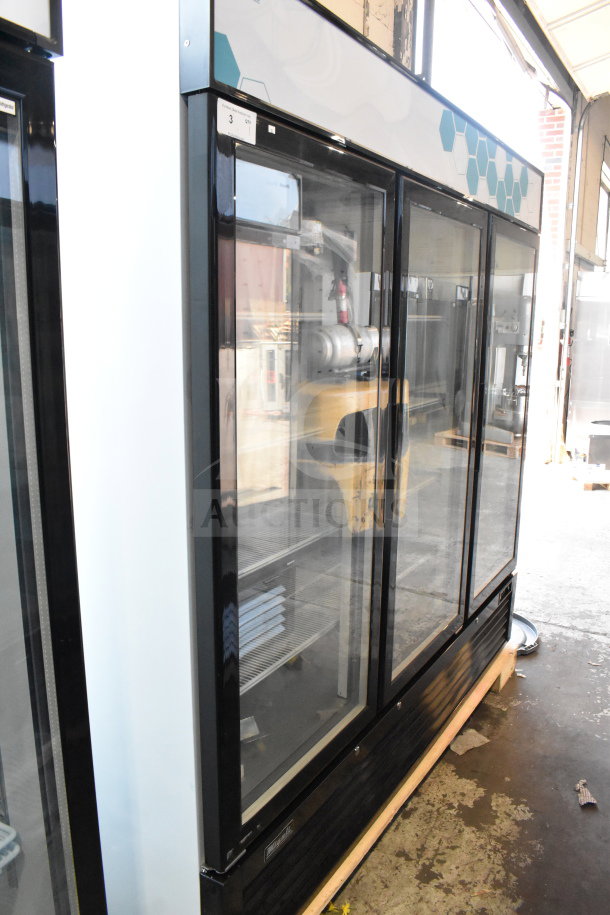 Brand new 2019 Migali C-72RM-HC commercial 3-door reach-in cooler on casters. 115V, 1 phase, with minor cosmetic scratches.