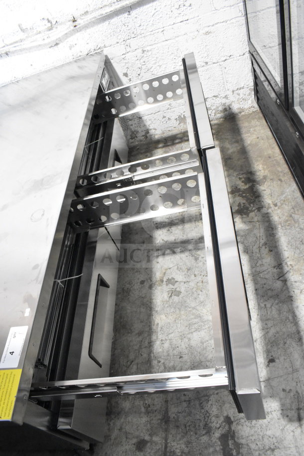 Brand new Migali C-CB72-HC 4-drawer chef base, commercial casters, 115 volts, minor scratches, stainless steel.