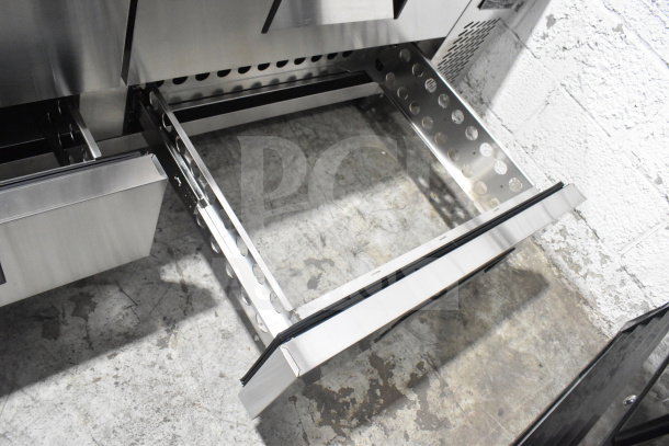 Brand new Migali C-CB72-HC commercial chef base, four drawers, on casters, 115V, showing open drawer detail.