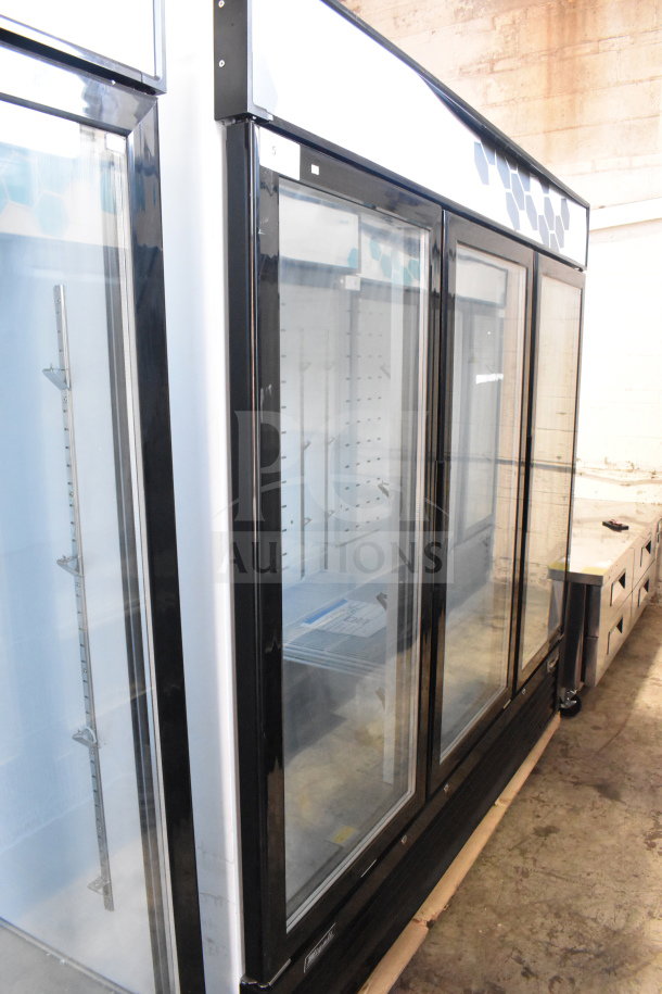 BRAND NEW 2022 Migali C-72FM-HC 3-Door Freezer Merchandiser with commercial casters, 115/208-230V, 1 Phase.