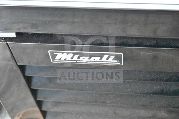 Migali C-72FM-HC freezer merchandiser, brand new, 3-door, commercial casters, black finish, visible brand logo.