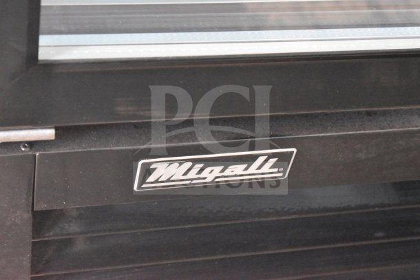 Migali C-72FM commercial freezer logo detail, black finish. Serial C-72FM00319040400920014 visible.
