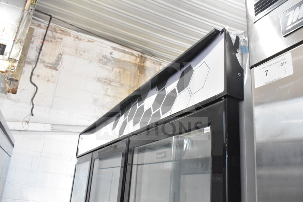 BRAND NEW Migali C-72FM 3-door freezer merchandiser, commercial use, 115/208-230V, slight scratches, serial visible.