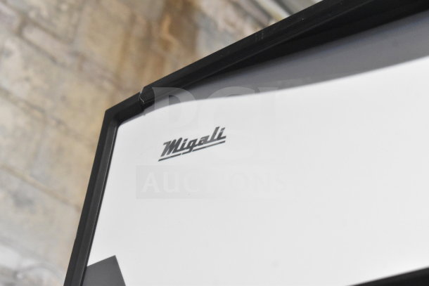 Migali logo on brand new 2019 C-72FM 3-door commercial freezer merchandiser. Scratch and dent model.