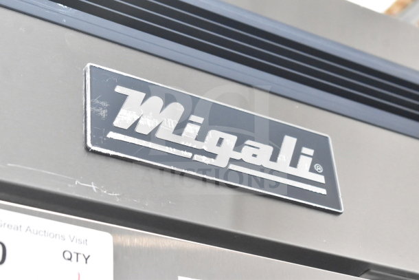 Brand new Migali C-3FB-HC commercial freezer, three-door, scratch and dent, on casters, 115V, 1 phase, serial C-3FB-HC003220303092C0003.