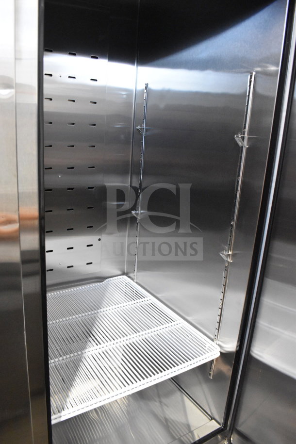 BRAND NEW 2022 Migali C-3FB-HC commercial 3-door freezer with shelves. Scratch and dent, on casters, 115V, 1 Phase.