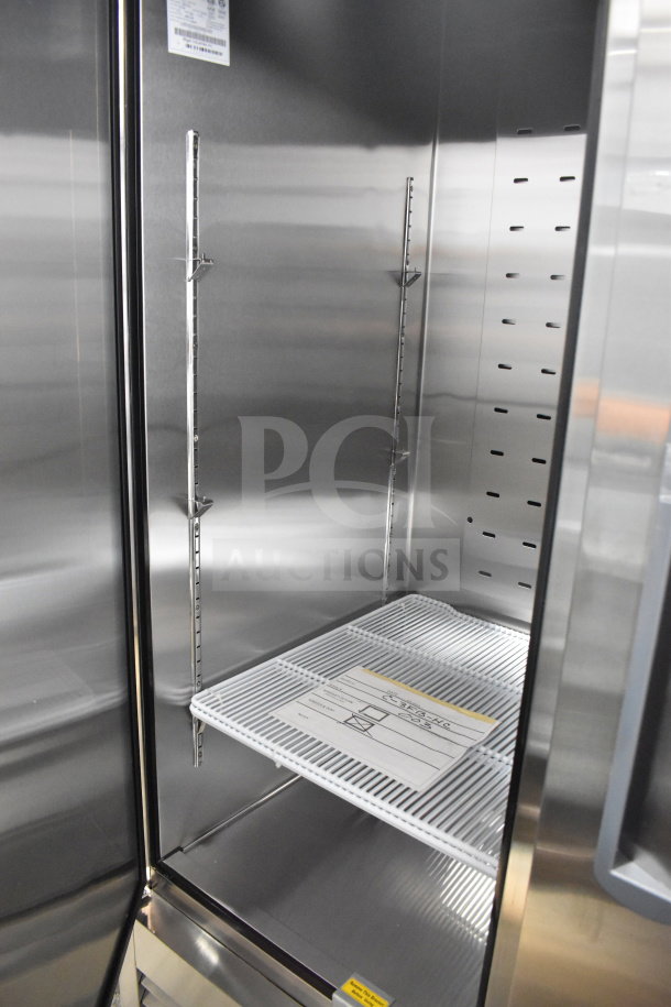 Brand new Migali C-3FB-HC 3-door commercial freezer, scratch and dent condition, on casters, 115V, 1 phase, serial C-3FB-HC003220303092C0003.
