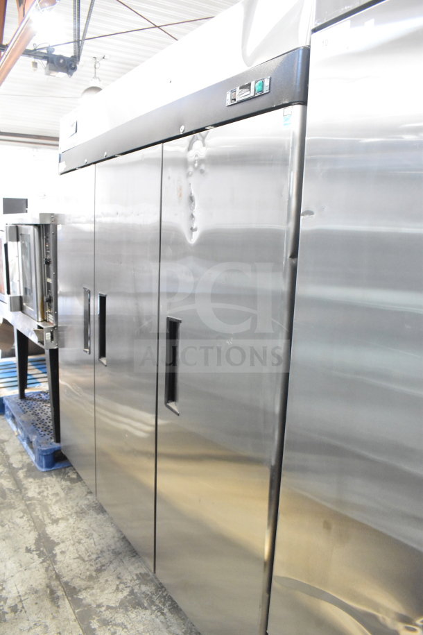 Migali C-3R-HC commercial 3-door cooler, 2019 model, brand new with scratches and dents, on commercial casters.