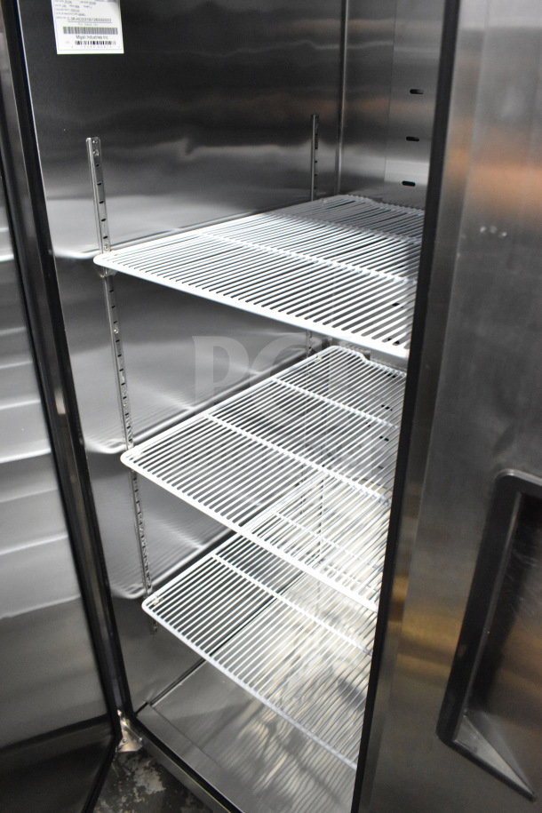 Migali C-3R-HC 3 Door Commercial Cooler, brand new, scratch and dent, 115V, shelves, and label with serial number visible.