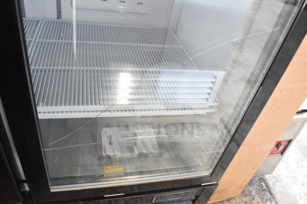 Migali C-3R-HC 3 Door Reach-In Freezer Merchandiser, scratch on glass, on casters, 115/208-230V, model C-72FM-HC.