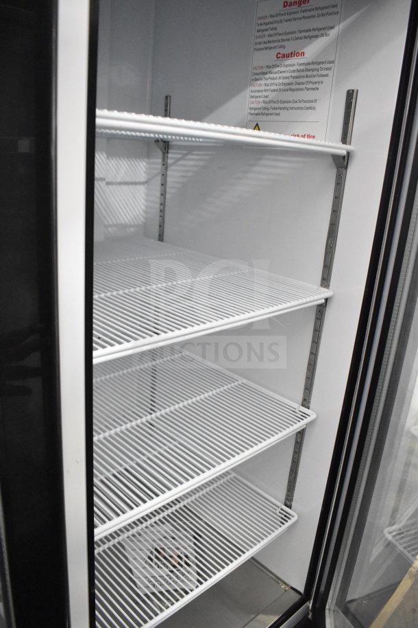 Brand new 2020 Migali C-72FM-HC 3-door reach-in freezer with commercial casters, 115/208-230V, 1 phase, scratch and dent.