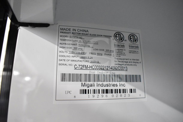 BRAND NEW Migali C-72FM-HC 3-door freezer merchandiser, scratch and dent, on commercial casters, 115/208-230V, 1 Phase.