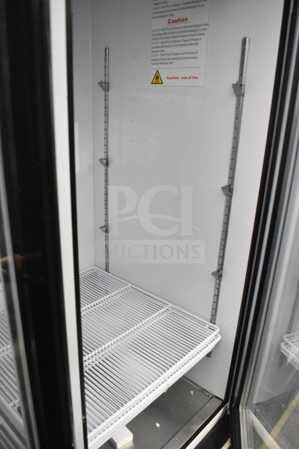 Brand new 2022 Migali C-72FM-HC 3-door reach-in freezer merchandiser, scratch and dent, 115/208-230 volts.