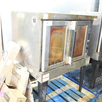 Hobart commercial gas convection oven with view-through doors, thermostatic controls, metal legs; used condition.