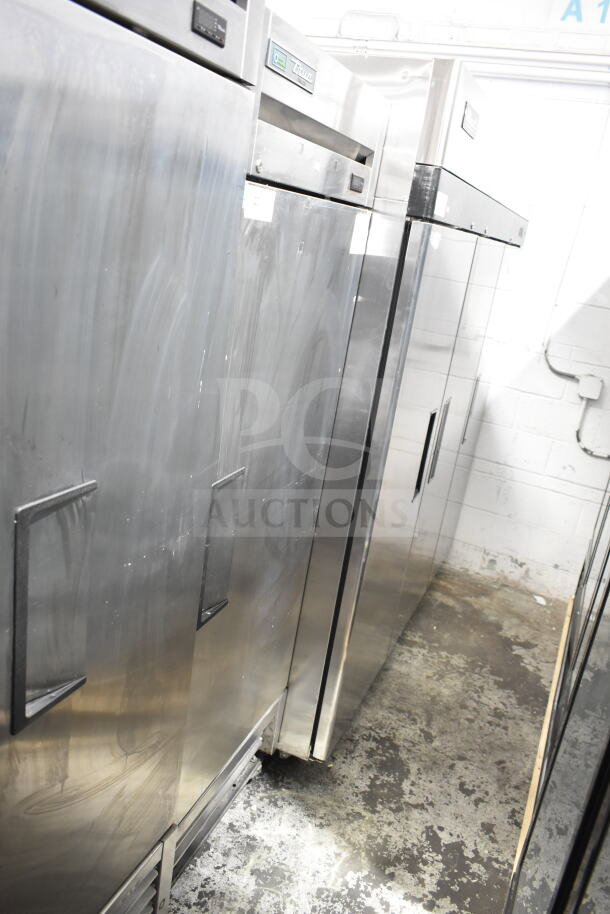 True commercial single door reach-in freezer, stainless steel, 115 volts, 1 phase, good condition, visible brand logo.