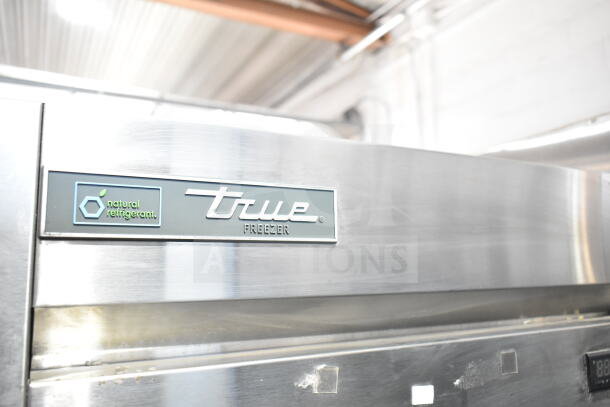 True Commercial Single Door Reach In Freezer, 115V, 1 Phase. Stainless steel with True logo and "natural refrigerant" label.